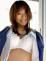 Towa Aino schoolgitl model shows off big boob cleavage in an open shirt