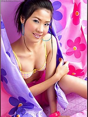 Kieko Kyo tickles us pink in her curtain hideout