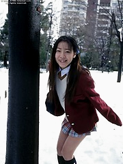 Japanese cutie Aika plays hard to get in the snow