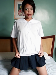 Cute and shy Josya strips from her school uniform to show her neat hairless slit